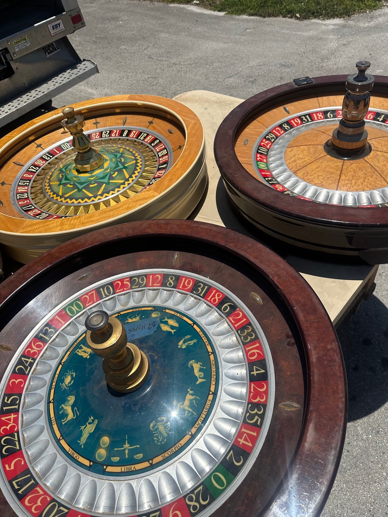 Three real-wood roulette wheels in the workshop